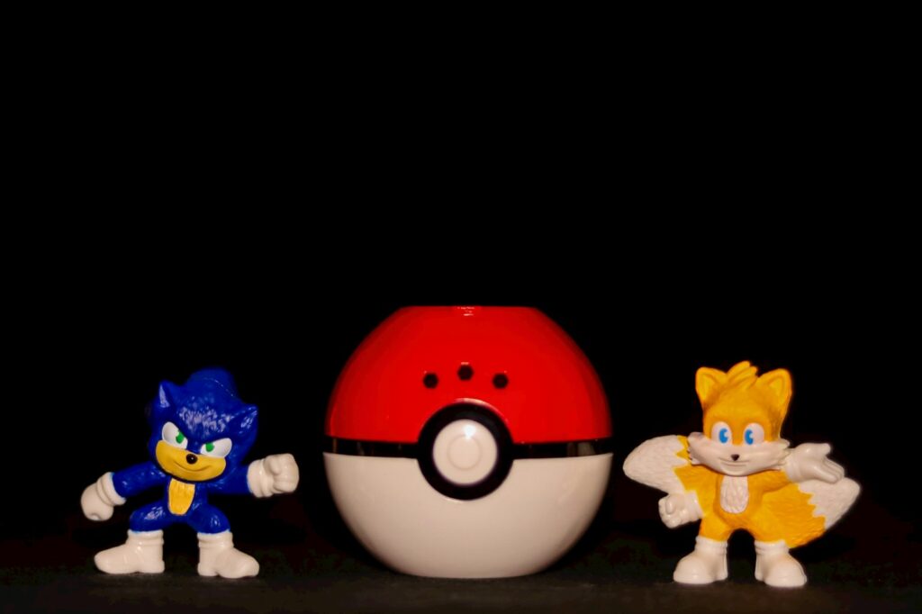 Three toy figurines of sonic and tails