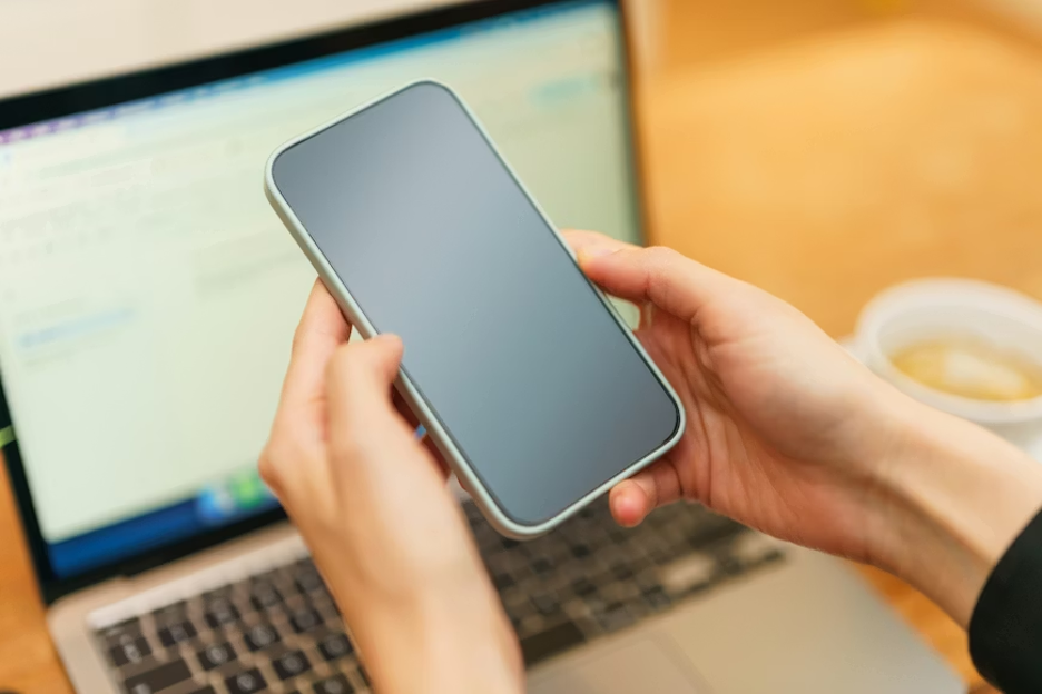 woman holding a phone