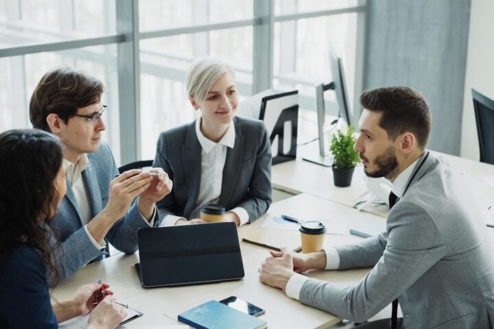 Diverse business team collaborating in a modern office.