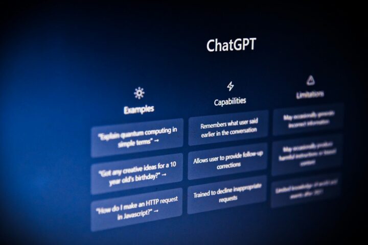 The ChatGPT interface showing examples, capabilities, and limitations on a dark blue screen